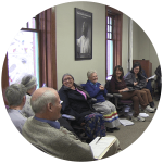 A group of people share a laugh.